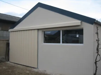 Fabrication d’une porte de garage (hangar) coulissante.